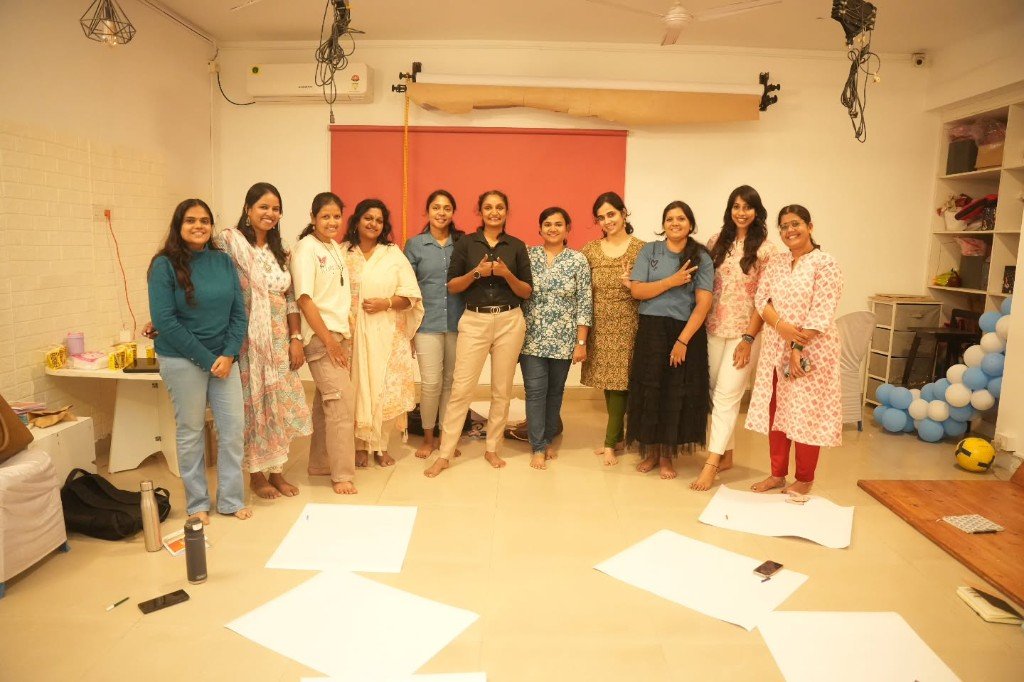 Mothers standing together after a live workshop